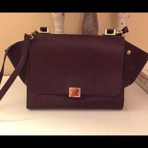 Genuine leather trapeze style bag